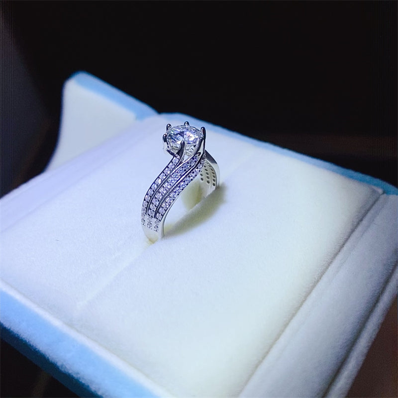 1 Carat Moissanite ring in 925 Sterling Silver displayed on a plush ring box.