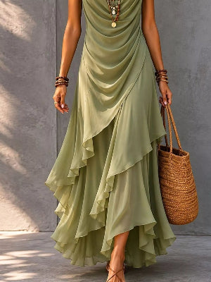 Black women's midi dress with draped fabric and flowing skirt