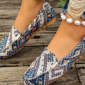 Patterned flat loafers worn with cropped jeans
