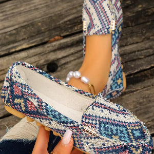 Women's loafers styled with cropped denim jeans