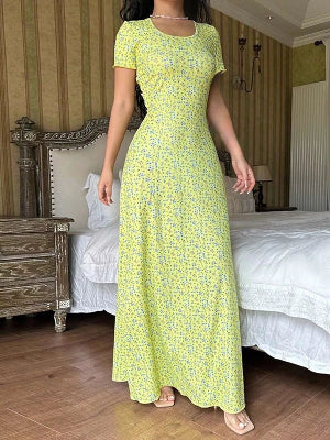 Yellow floral casual women's dress with a long flowing skirt